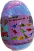 MUSUJĄCE JAJO DINOZAURA- Wata cukrowa 140 G Z NIESPODZIANKA Estetica
