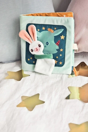 LILLIPUTIENS Miękka książeczka aktywizująca z mini-komforterem „Joe i jego przytulanka” 12 m+