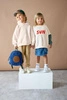 Lassig Bluza z bawełny organicznej GOTS Little Gang Sun milky 7-12 m-cy