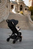 Easywalker Jackey Special Edition Kompaktowy, samoskładający się wózek spacerowy z torbą transportową Gold