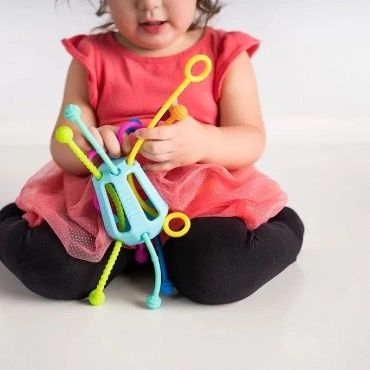 Przeciąganiec Zippee. Zabawka sensoryczna - Mobi