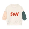Lassig Bluza z bawełny organicznej GOTS Little Gang Sun milky 7-12 m-cy