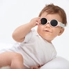 Beaba Okulary przeciwsłoneczne dla dzieci z elastyczną opaską 0-9 miesięcy Chalk pink