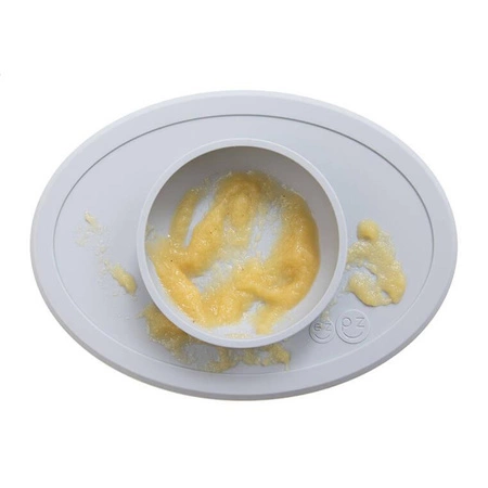 EZPZ Komplet pierwszych naczyń silikonowych First Foods Set pastelowa szarość + kubeczek Tiny Cup GRATIS pastelowa szarość