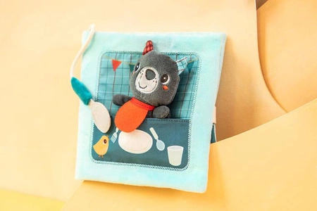 LILLIPUTIENS Książeczka aktywizująca z mini-przytulanką Smacznego! Wilk Louis 12 m+