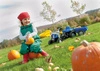 Rolly Toys rollyKid-X New Holland rollyKid Traktor z łyżką i przyczepką Niebieski