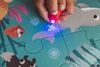 Świecące puzzle z mini-lampką UV Ocean 24 elementy 3+, Janod