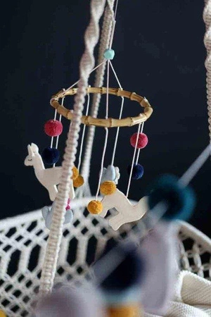 Karuzela na drewnianej obręczy, Lama, Kikadu