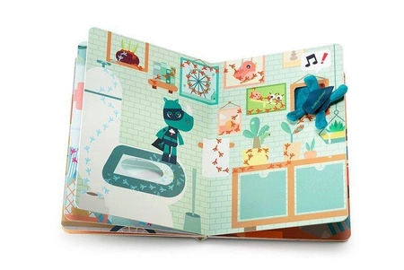 LILLIPUTIENS Książeczka przygodowa z mini-przytulanką kartonowa „Marius superbohater” 2 l+