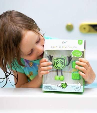 Glo Pals, Postać do kąpieli Pippa - zestaw z dwiema kostkami sensorycznymi świecącymi w wodzie