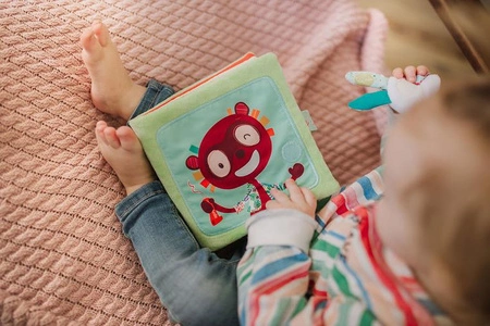 LILLIPUTIENS Książeczka z mini-pacynką wielofunkcyjna Królik dentysta 12 m+