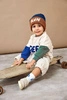 Lassig Bluza z bawełny organicznej GOTS Little Gang Free milky 7-12 m-cy