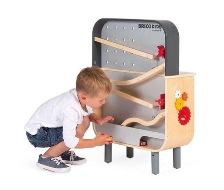 Dwustronny drewniany stolik warsztatowy z 34 akcesoriami Brico'kids 3-8 lat, Janod
