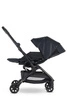MINI by Easywalker Buggy TURN Kompaktowy wózek spacerowy z obrotowym siedziskiem 360° Oxford Black (z osłoną przeciwdeszczową w zestawie)