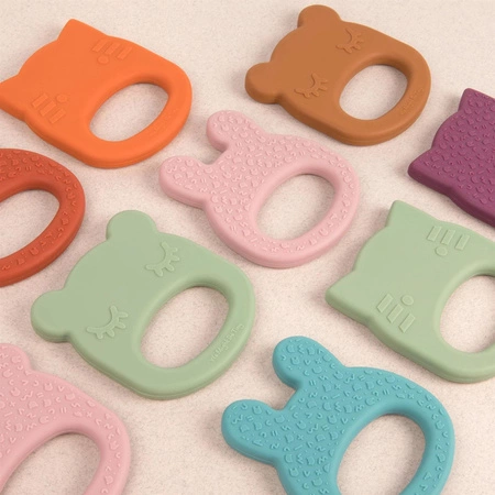 Silikonowy gryzak We Might be Tiny Kot - Sage