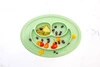 EZPZ Silikonowy talerzyk z podkładką mały 2w1 Mini Mat pastelowa zieleń