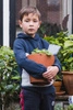 Zestaw zabawek do piasku w wiaderku Zsilt Happy Orange - 12 miesięcy +