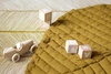 TODDLEKIND Mata do zabawy z bawełny organicznej w kształcie liścia Leaf Mat Sand Castle